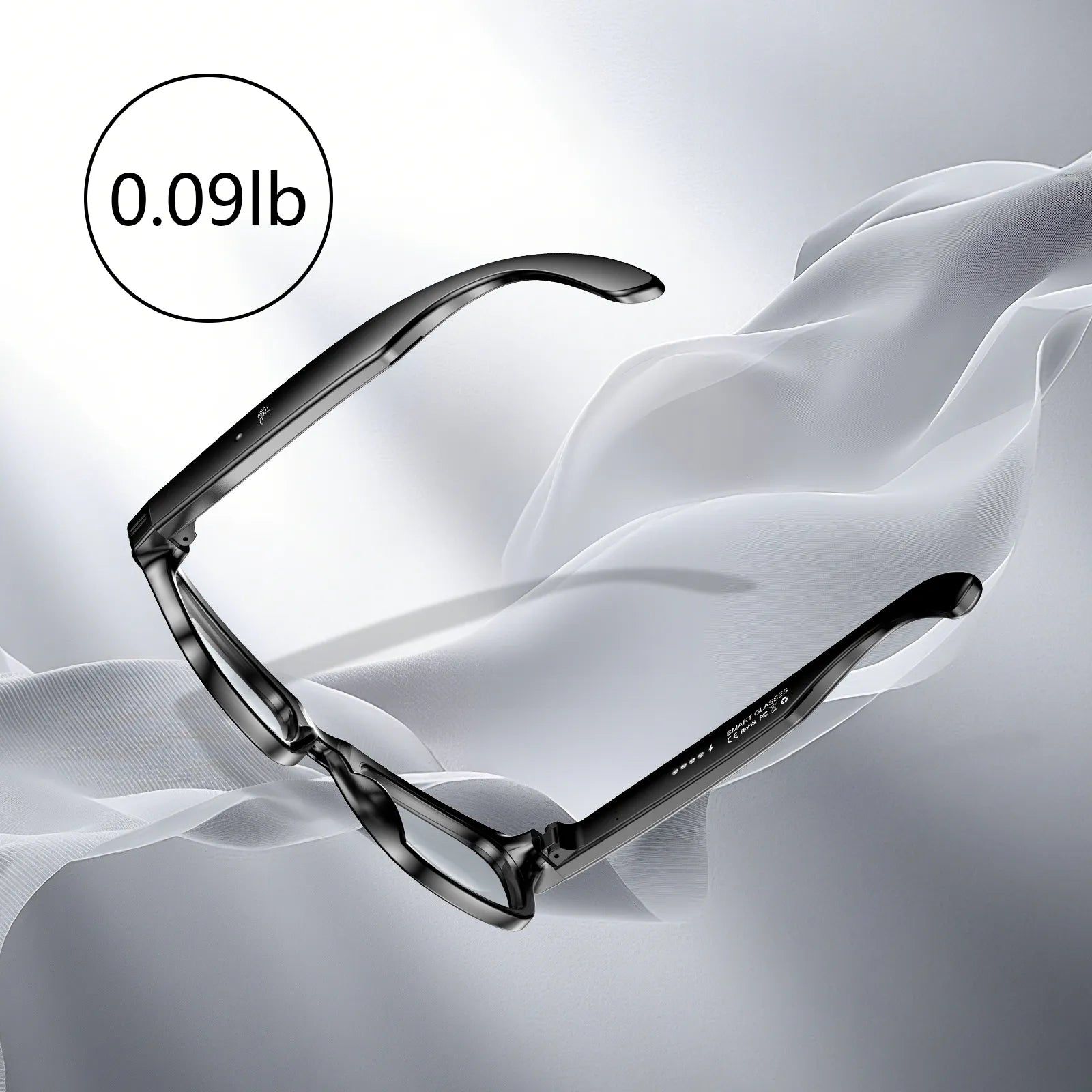 Pair of Meacode Glasses on a white fabric background with weight label '0.09lb'.