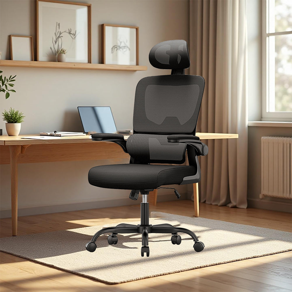 Black Ocanvas Office Chair in a modern home office setting with a desk and laptop.