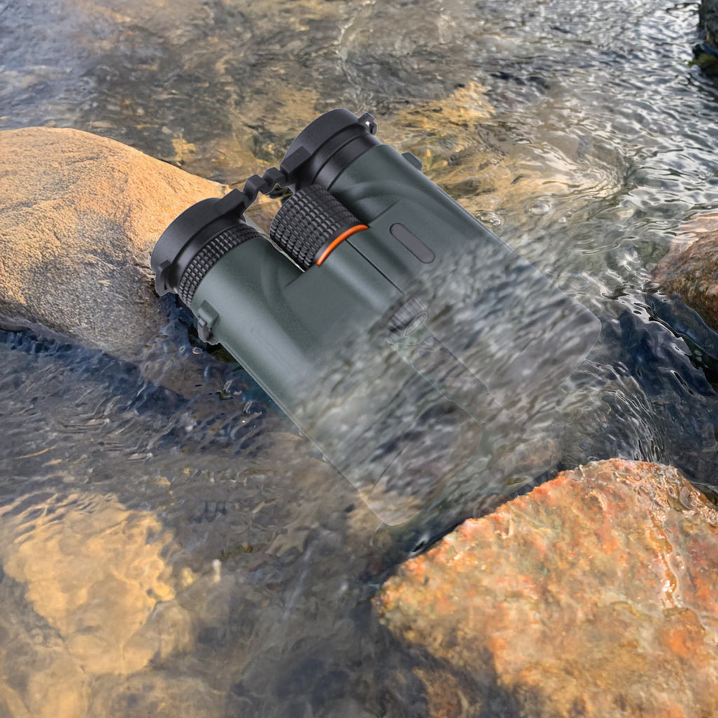 Aetheros Binoculars on a rock with water flowing around them