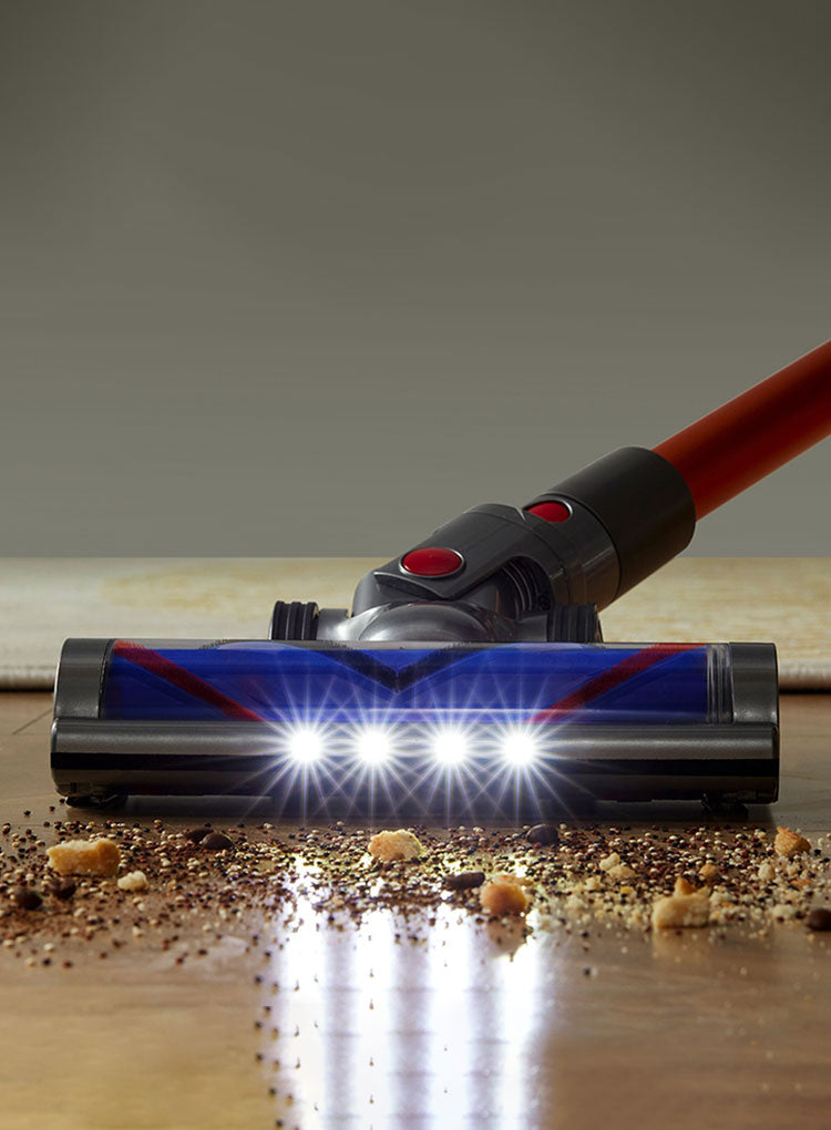 Balzy Hoover Cleaner head cleaning a wooden floor with visible dirt.