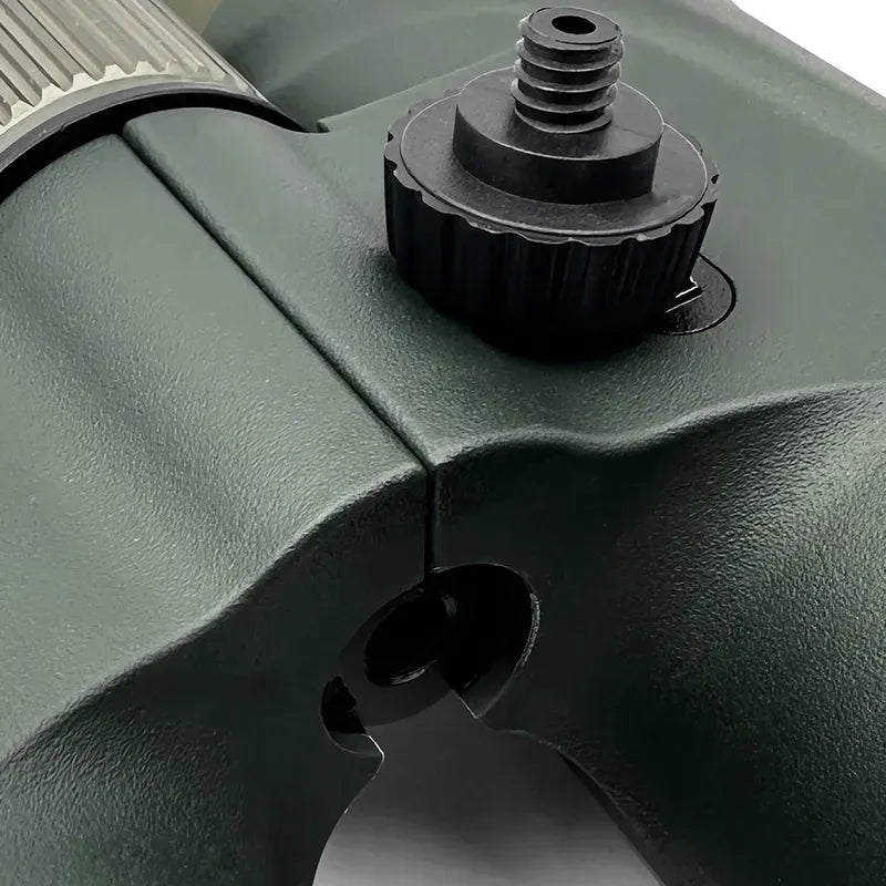 Close-up of a green Bosco Binoculars C9 component with a black screw on a white background