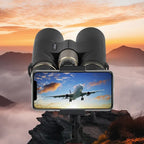 Bosco Binoculars C9 with a smartphone displaying an airplane flying over clouds, set against a mountainous landscape.