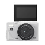 ClikTric Compact Camera with a screen on top and lens in the front, on a white background