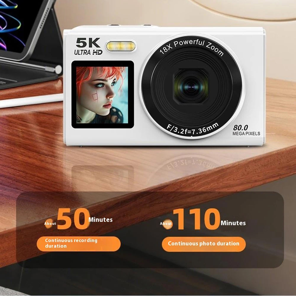 ClikVis Digital Camera with display on a wooden surface, showing technical specifications.