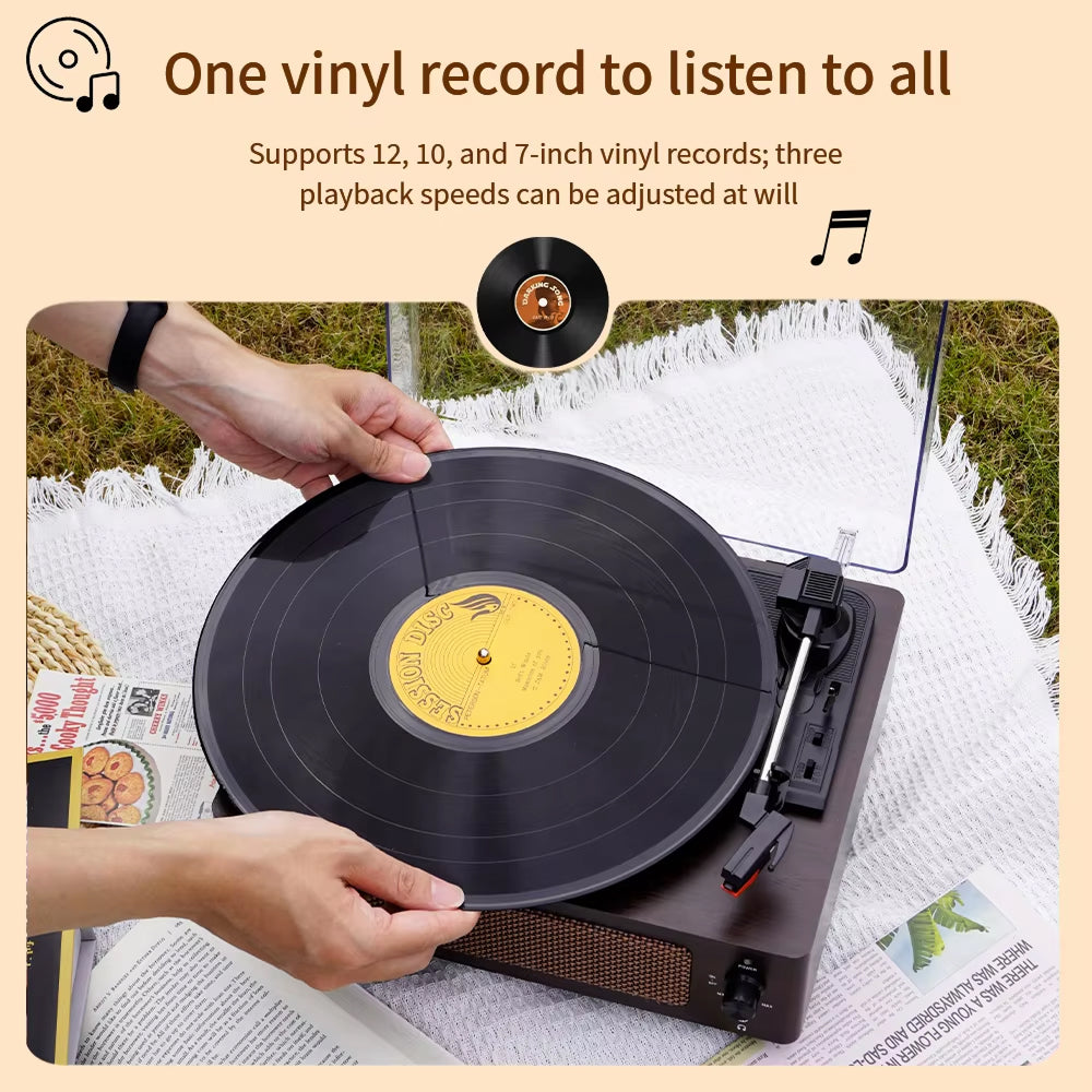 Person holding a EchoSpini Record Player  with text about vinyl records and playback speeds.