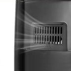 Close-up of a metallic surface with a vent and light reflections