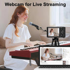 Woman playing keyboard with microphone and JixinCam Digital Camera for live streaming setup.