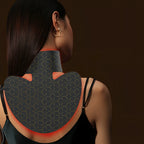 Woman wearing a black garment with geometric pattern on a dark background