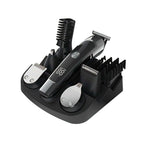Set of grooming tools including a Kozenix Hair Clipper, trimmer, and comb on a white background