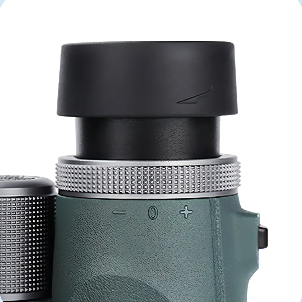 Close-up of a Kozenix Binoculars with a focus on the eyecup and control buttons on a white background.