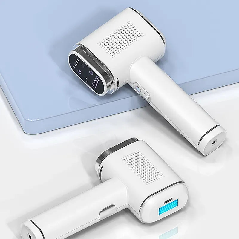 White Kozenix IPL Hair Removal AB50 device with digital display on a light blue surface