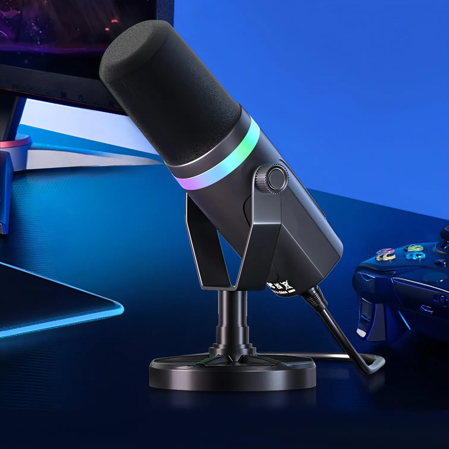 Black kozenix Microphone with RGB lighting on a stand in front of a computer setup