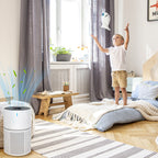 Child playing with a toy in a room with an Marvics Air Purifiers on the floor.