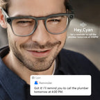 Man wearing Meacode AI Smart Glasses with a blurred background, featuring a digital reminder notification.