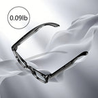Pair of Meacode Glasses on a white fabric background with weight label '0.09lb'.