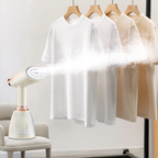 White t-shirt hanging on a rack with a Meacode Steamer next to it.