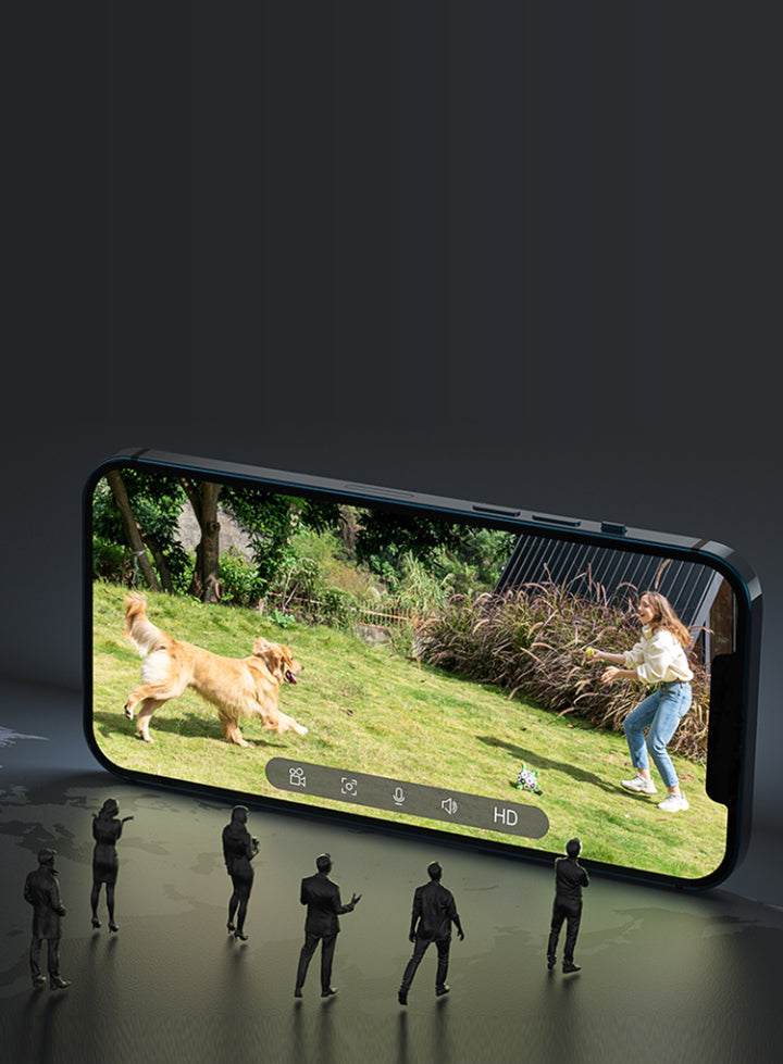 Smartphone displaying a video of a woman with two dogs on a grassy field, with people standing around the phone.