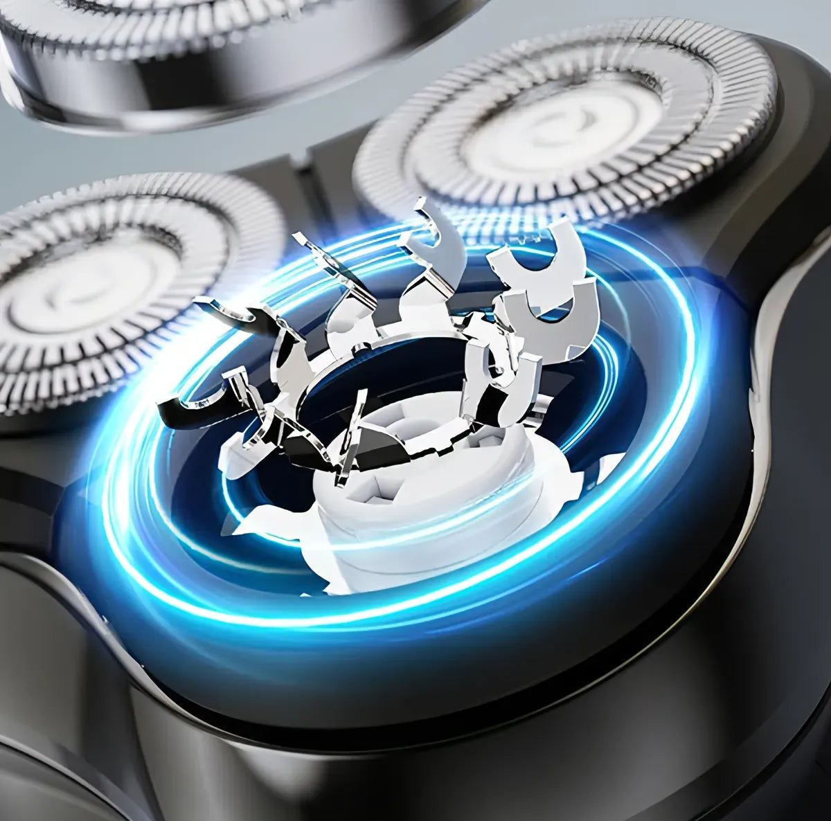 Close-up of an Orivana Electric Shaver head with four circular shaving nozzles and a central rotating brush assembly, shown with bright blue glowing rings on a dark metallic surface.