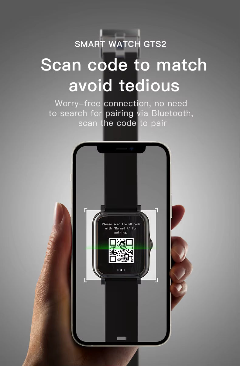 Qnixwatch being scanned by a phone with QR code on a gray background