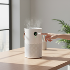 White Veoair Air7 Air Purifier on a wooden table with a hand touching it, in a bright room with plants.