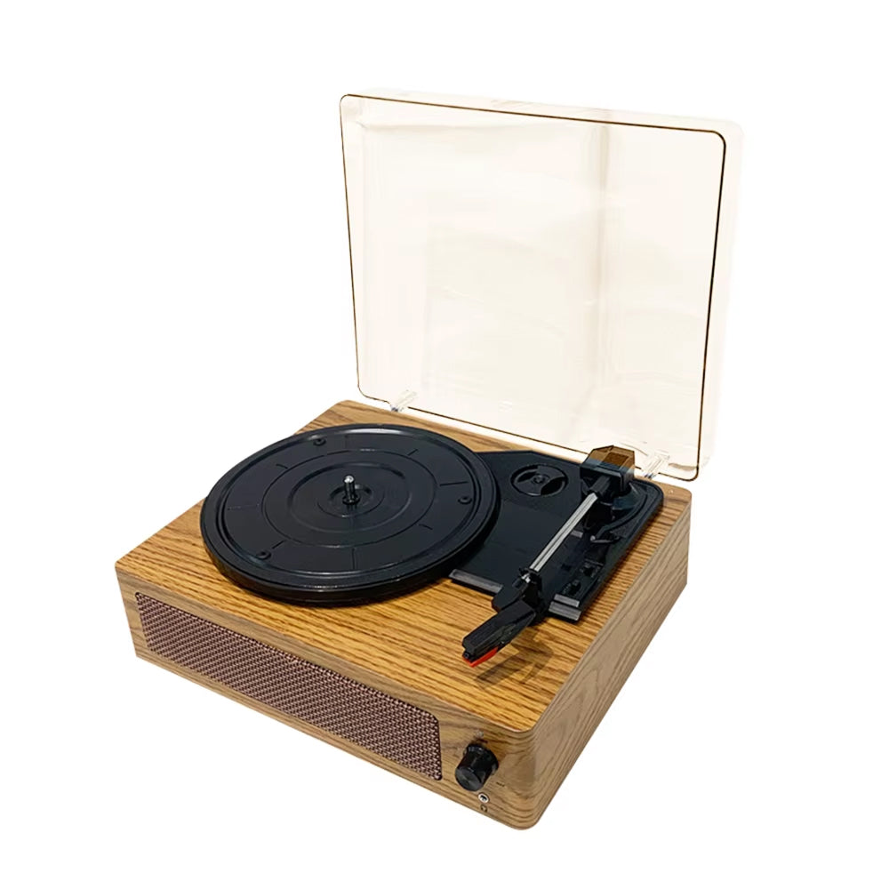 Wooden VinyyLux Record Player with transparent dust cover on a white background