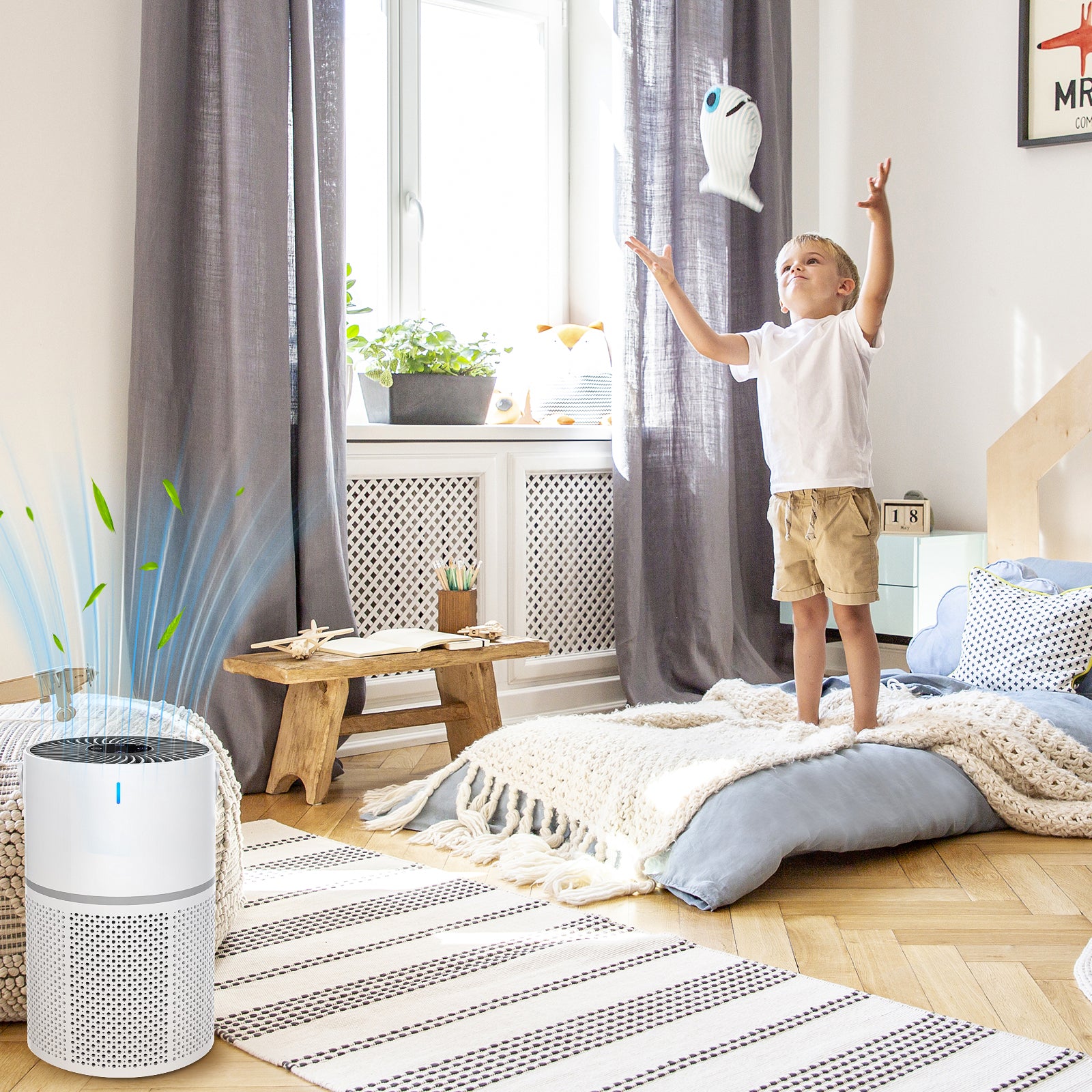 Child playing with a toy in a room with an Vorthic Air Purifier on the floor.