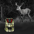 Camouflage Vorthic Trail Camera with a deer in the background