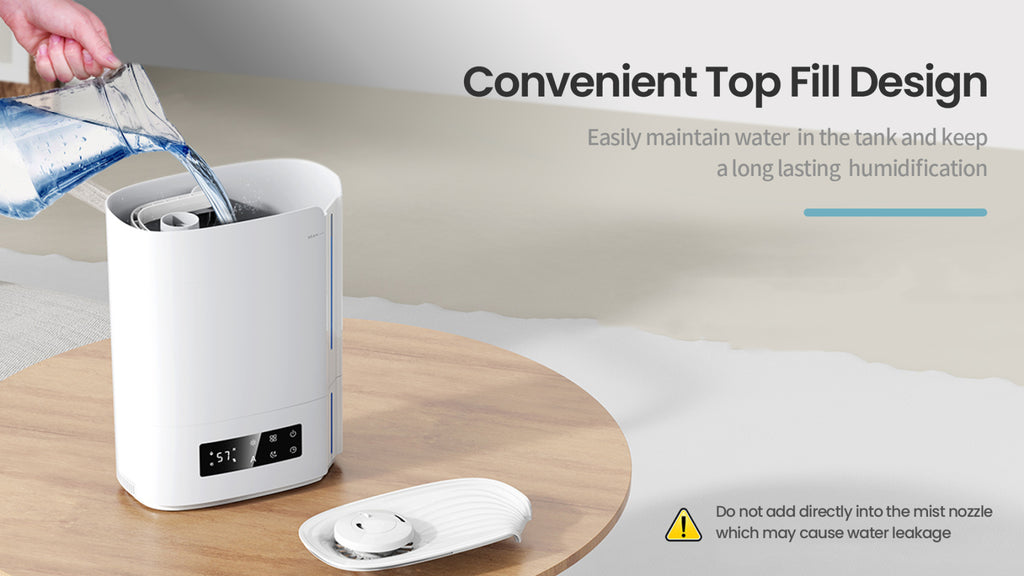 Zynova Humidifier with top fill design on a wooden surface, water being poured in.