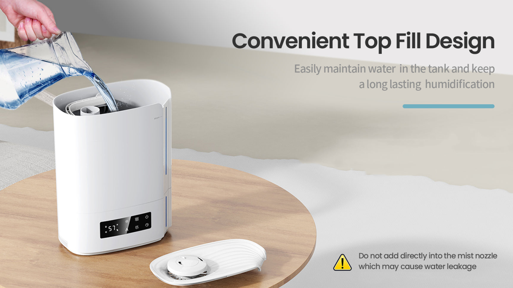 Zynova Humidifier with top fill design on a wooden surface, water being poured in.