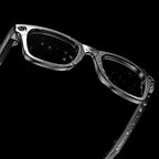Black Keovy Smart Glasses with a metallic frame on a black background