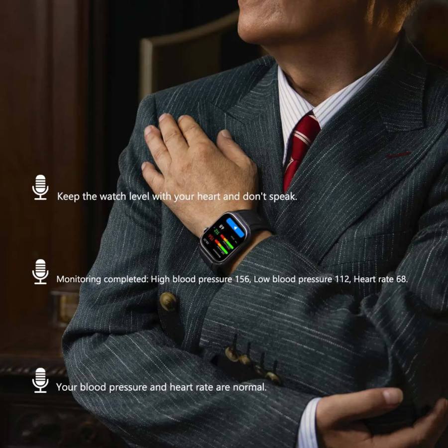 Man wearing a Pilotax Blood Pressure Smartwatch with health monitoring display, sitting indoors.
