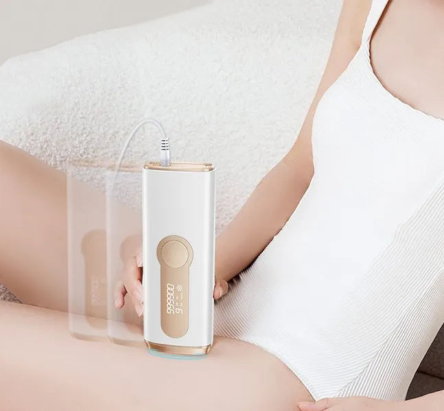 Person using a Kozenix IPL Hair Removal AS20 device on their abdomen with a neutral background